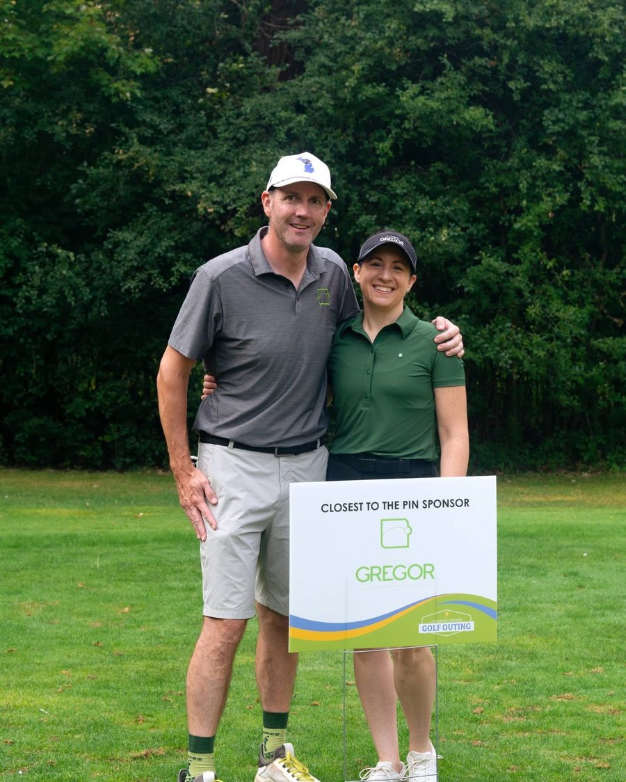 Gregor Closest to the Pin sponsor sign at a chamber golf outing